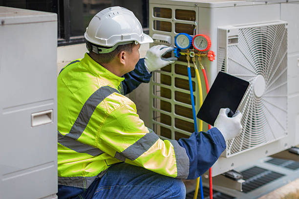 Professional Air Duct Cleaning technician working in Grinnell, IA